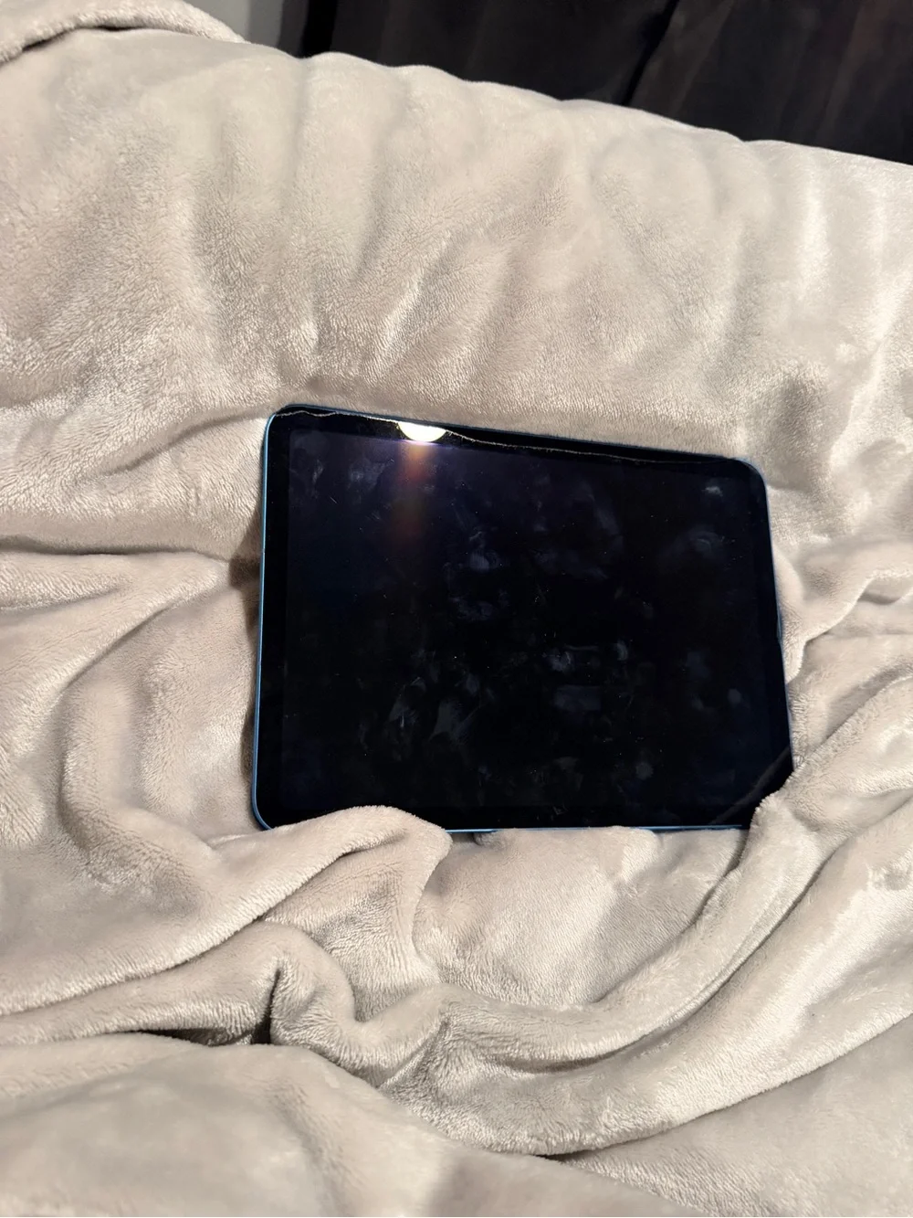 Apple Tablet with Blue Frame